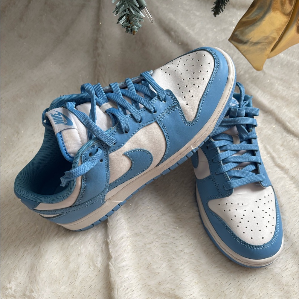 I’m selling sky blue and white low top Nike Air Dunks, these are 8.5.